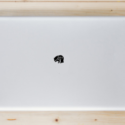 Baby Bear Laptop Sticker shown on a laptop lid