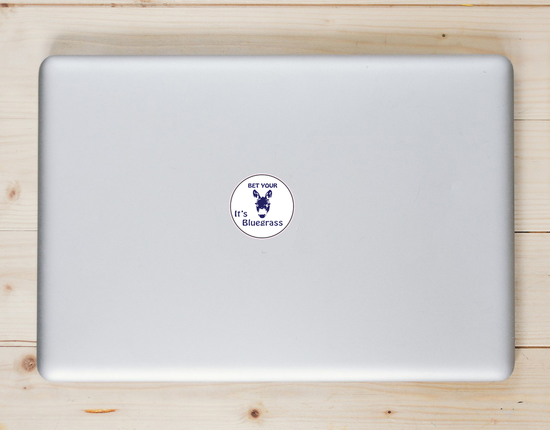 Bet your ass it's Bluegrass Laptop Sticker shown on a laptop lid