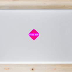 Boss Mom Retro Laptop Sticker shown on a laptop lid