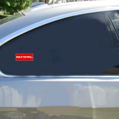 Build The Wall Bumper Car Sticker shown on a vehicle rear window