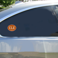 CLE Cleveland Ohio Brown Oval Car Decal shown on a vehicle rear window