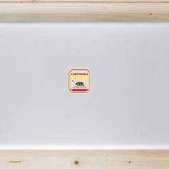 California Vintage Retro Flag Laptop Sticker shown on a laptop lid