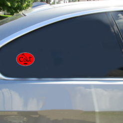 Cat Mom Red Oval Car Sticker shown on a vehicle rear window