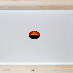 Cincinnati Red Black Oval City Laptop Sticker shown on a laptop lid
