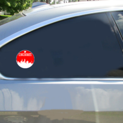 Cincinnati Red Skyline Circle Car Sticker shown on a vehicle rear window