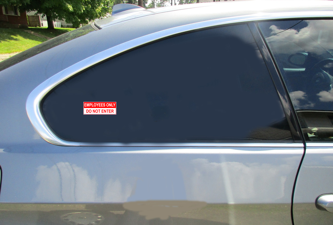 Employees Only Do Not Enter Car Sticker shown on a vehicle rear window