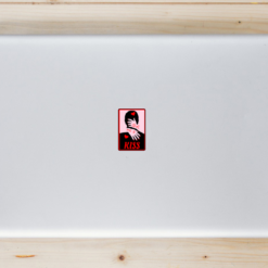 Give Me A Kiss Lovers Laptop Sticker shown on a laptop lid