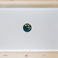 Hawaii Palm Tree Sun Circle Laptop Sticker shown on a laptop lid