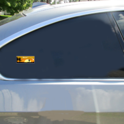 Hawaii State Sunset Bumper Car Sticker shown on a vehicle rear window