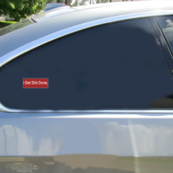 I Get Shit Done Bumper Car Sticker shown on a vehicle rear window