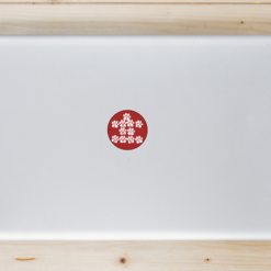 I Love My Dogs Paw Circle Laptop Sticker shown on a laptop lid