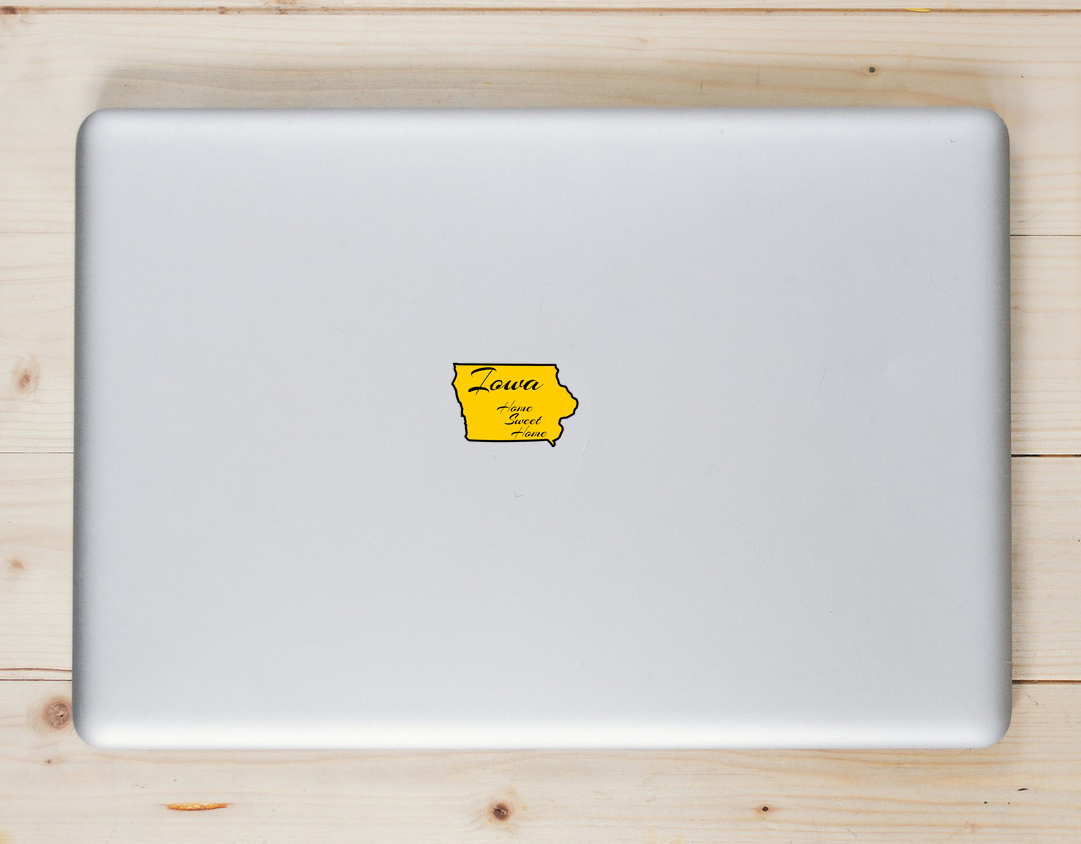 Iowa Home Sweet Home State Shaped Laptop Sticker shown on a laptop lid