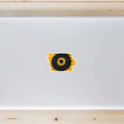 Iowa Tie Dye State Laptop Sticker shown on a laptop lid