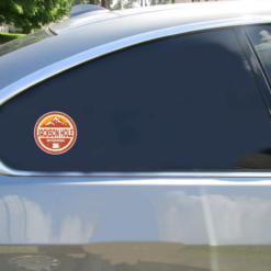 Jackson Hole Valley Wyoming Distressed Car Sticker shown on a vehicle rear window