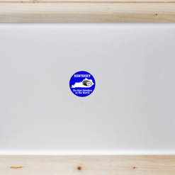Kentucky Best Bourbon Blue Circle Laptop Sticker shown on a laptop lid