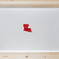 Lafayette Louisiana State Shaped Laptop Sticker shown on a laptop lid