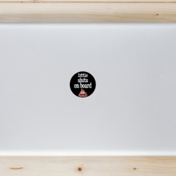 Little Shits On Board Laptop Sticker shown on a laptop lid