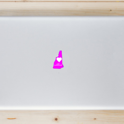 New Hampshire Pink Heart Laptop Sticker shown on a laptop lid