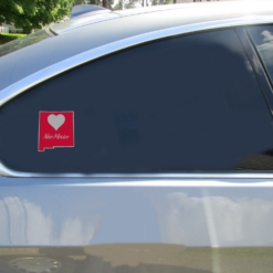 New Mexico Heart State Shaped Car Sticker shown on a vehicle rear window