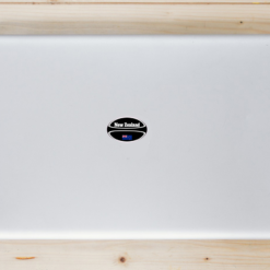 New Zealand Flag Rugby Ball Laptop Sticker shown on a laptop lid