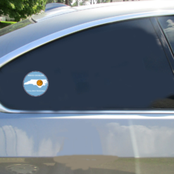 North Carolina All About Basketball Circle Car Decal shown on a vehicle rear window