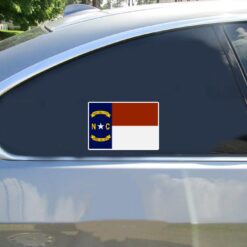 North Carolina Flag Car Sticker shown on a vehicle rear window
