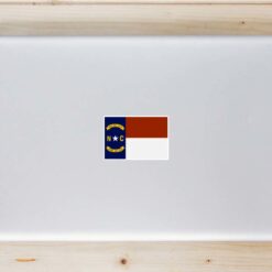 North Carolina Flag Laptop Sticker shown on a laptop lid