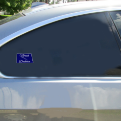 North Dakota Home Sweet Home Car Sticker shown on a vehicle rear window