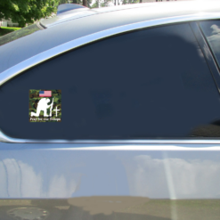 Pray For Our Troops Camouflage Car Sticker shown on a vehicle rear window