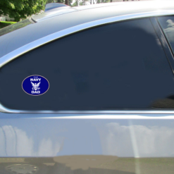 Proud Navy Dad Oval Car Sticker shown on a vehicle rear window