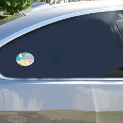 Rather Be At The Beach Oval Car Sticker shown on a vehicle rear window