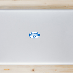 Scotland Rugby Ball Shaped Laptop Sticker shown on a laptop lid