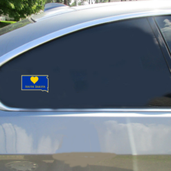South Dakota Heart State Shaped Car Sticker shown on a vehicle rear window