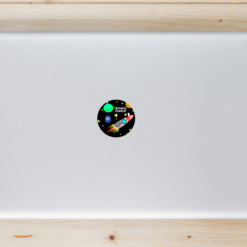 Space Force Funny Circle Laptop Sticker shown on a laptop lid