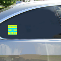 Spread Good Vibes Peace Car Sticker shown on a vehicle rear window