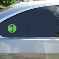 Stay Grounded Tree Pose Car Sticker shown on a vehicle rear window