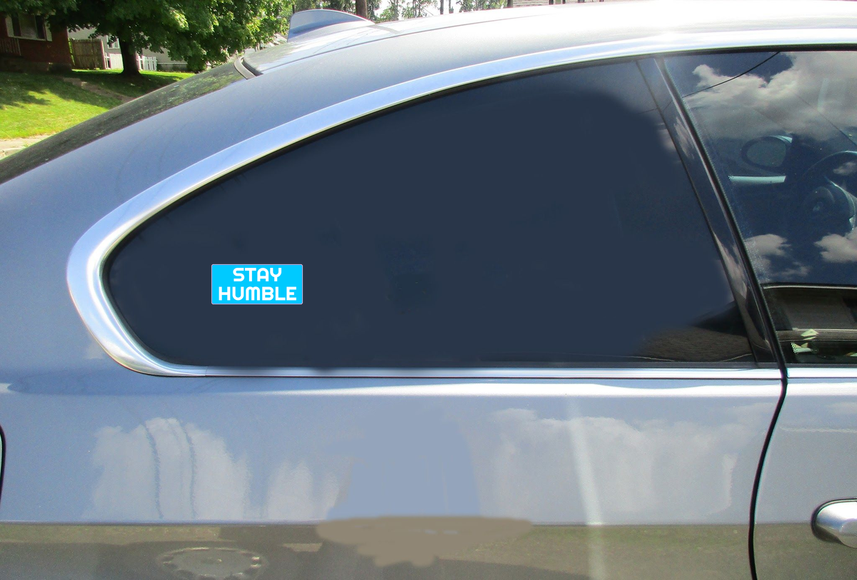 Stay Humble Car Sticker shown on a vehicle rear window