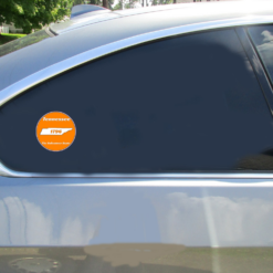 Tennessee The Volunteer State Orange Circle Car Decal shown on a vehicle rear window