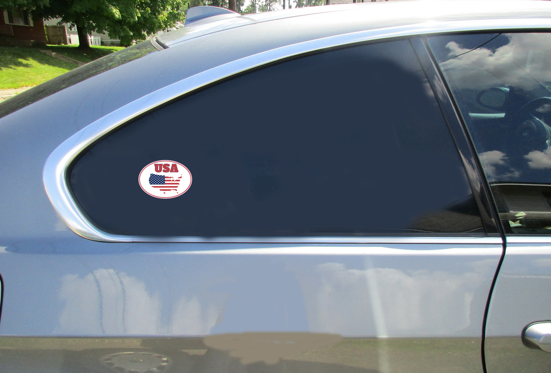USA Outline With Flag Oval Car Decal shown on a vehicle rear window