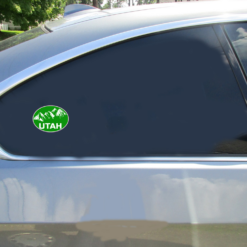 Utah Mountains Oval Car Sticker shown on a vehicle rear window