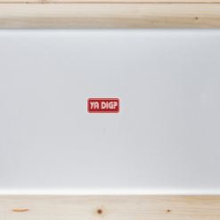Ya Dig Retro Laptop Sticker shown on a laptop lid