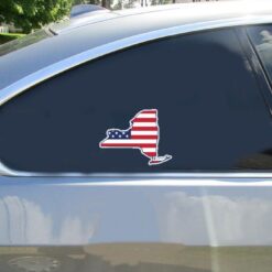 New York American Flag State Car Sticker shown on a vehicle rear window